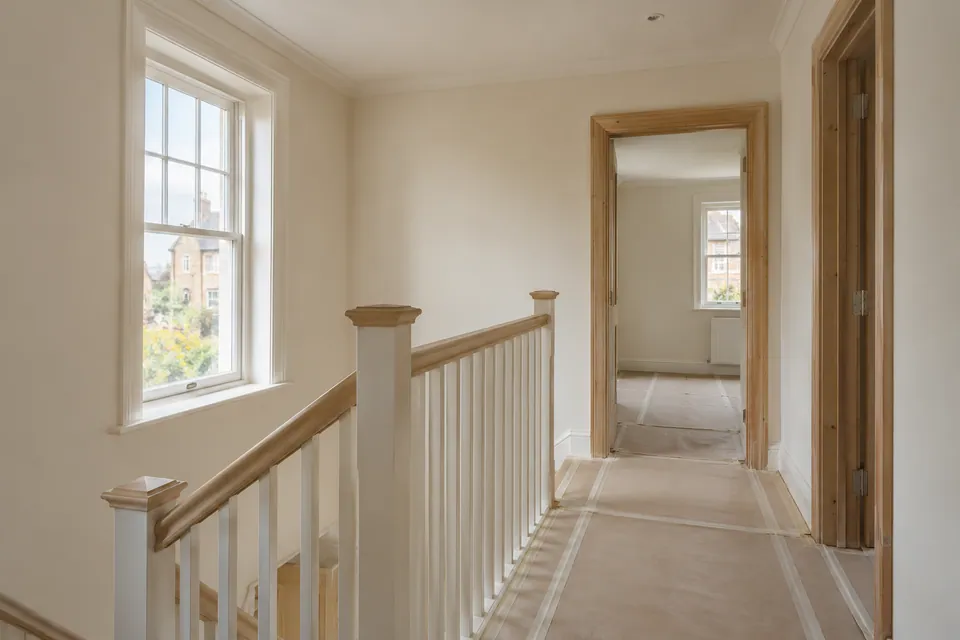 Timber landing and painted stair balustrade