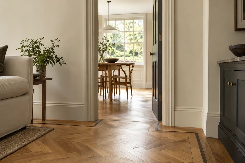 oak parquet border and retained architrave